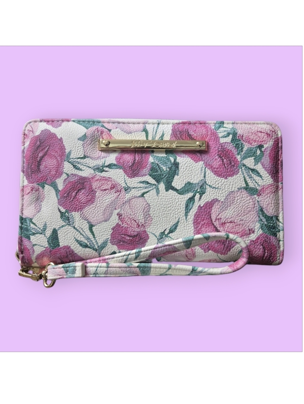💰Betsey Johnson women's floral zip-around wristlet wallet in pink and white.